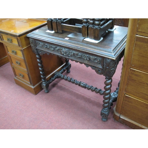 1455 - A Late XIX Century Carved Oak Centre Table, the top with a stepped moulded edge, drawer carved with ... 