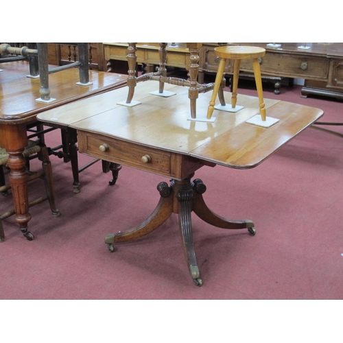 1465 - A XIX Century Mahogany Pembroke Table, with drop leaves and single drawer, raised on turned pedestal... 