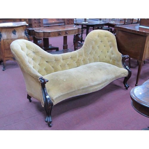 1472 - A XIX Century Mahogany Framed Chaise Longue, with button back and serpentine front rail on scroll ar... 