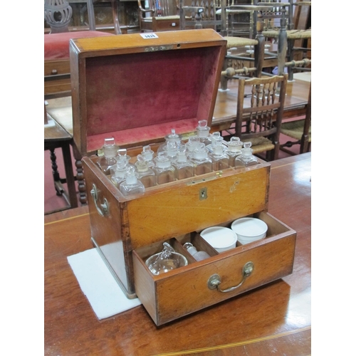 1474 - A Mid XIX Century Mahogany Apothecary Cabinet, the interior with eighteen various glass bottles and ... 