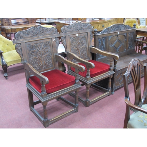 1483 - A Pair of XVII Century Style Joined Oak Wainscot Chairs, with a shaped scroll decorated cresting rai... 