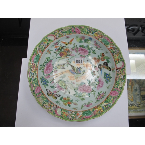 1092 - A Late XIX/Early XX Century Canton Famille Rose Dish, of shaped circular form, colourfully decorated... 