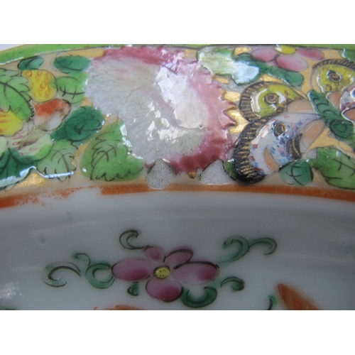 1092 - A Late XIX/Early XX Century Canton Famille Rose Dish, of shaped circular form, colourfully decorated... 