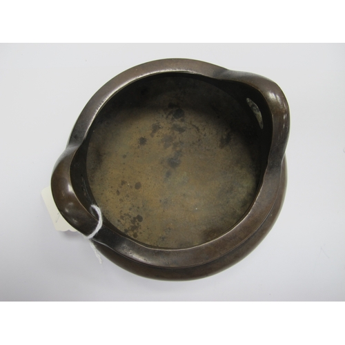 1099 - A Chinese Bronze Tripod Censer, of two handled circular form, six character mark to base, 12.5cm dia... 