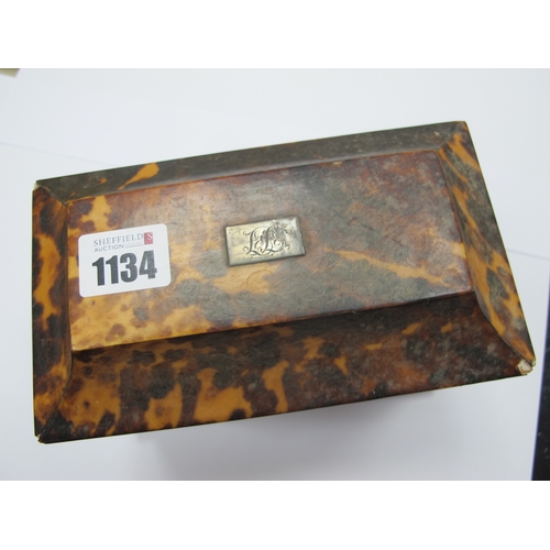 1134 - A Regency Tortoiseshell Tea Caddy, of sarcophagus form raised on bun feet, the interior with two com... 