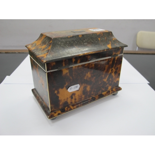 1134 - A Regency Tortoiseshell Tea Caddy, of sarcophagus form raised on bun feet, the interior with two com... 