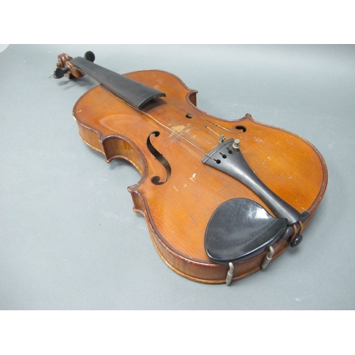 1146 - An Early XX Century Violin, with two-piece back, no label, with two bows, in case, length of back 36... 