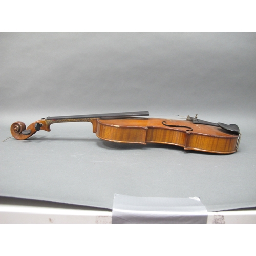 1146 - An Early XX Century Violin, with two-piece back, no label, with two bows, in case, length of back 36... 