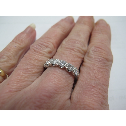 190 - A Modern 18ct White Gold Six Stone Diamond Half Eternity Style Ring, set throughout with uniform bri... 