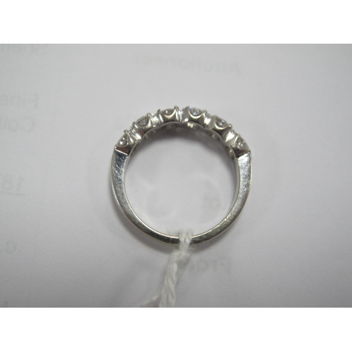 190 - A Modern 18ct White Gold Six Stone Diamond Half Eternity Style Ring, set throughout with uniform bri... 