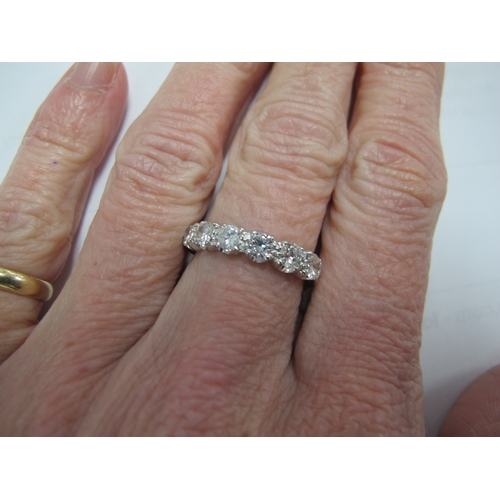 190 - A Modern 18ct White Gold Six Stone Diamond Half Eternity Style Ring, set throughout with uniform bri... 