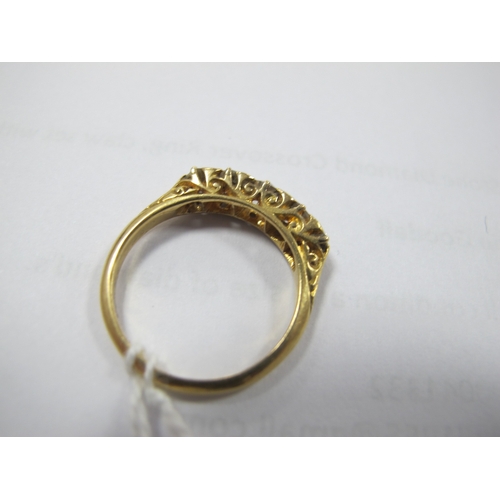 221 - An Edwardian 18ct Gold Five Stone Diamond Ring, the graduated old cut stones within scroll carved se... 