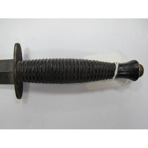 515 - A British Army Fairbairn Sykes Commando Style fighting Knife, with leather scabbard. (Buyer to fully... 