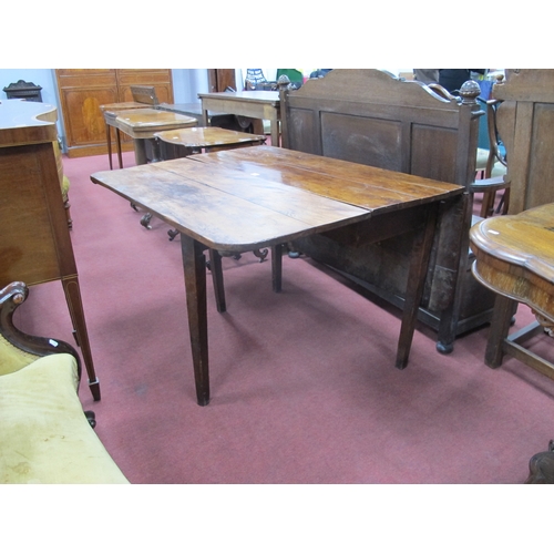 1481 - An Early XIX Century Fruitwood Drop Leaf Table, possibly yew wood, on square supports.