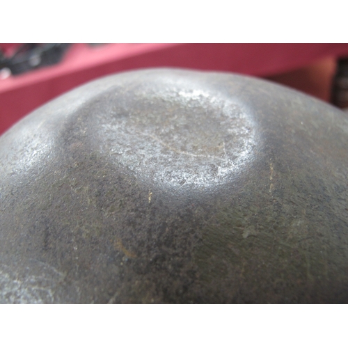 552 - A WWII American M1 Steel Combat Helmet,  with textured paint finish, some indentations to helmet she... 