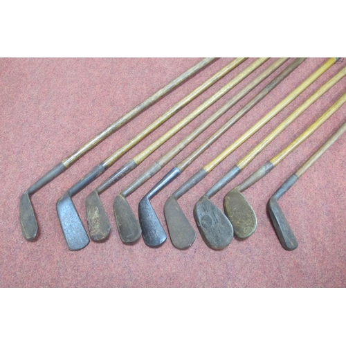 125 - Golf Clubs - All hickory shafted, including Whitcombe mashie,James Braid special iron (9), with canv... 