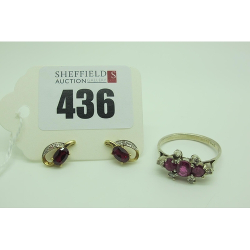 436 - A Pair of Modern Single Stone Earrings, oval claw set; together with a ruby and diamond dress ring, ... 