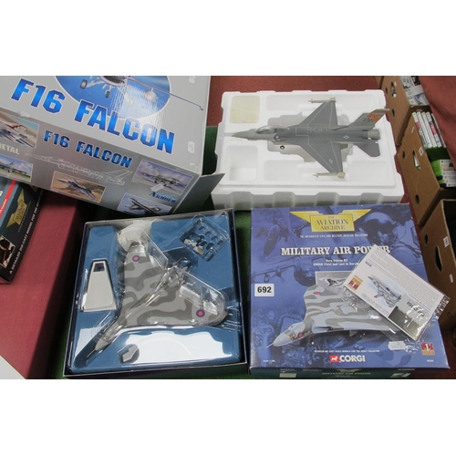 692 - Two Diecast Model Military Aircraft, comprising of collection armour 1:48 F16 Falcon, lacking under ... 