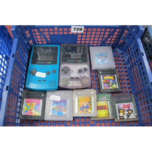 729 - Two Unboxed Gameboy Colour Hand Held Gaming Consoles, (teal and clear), untested sold for parts only... 