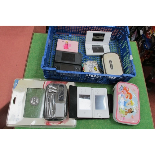 735 - Four Nintendo DS Handheld Gaming Consoles, untested sold for parts only, playworn.