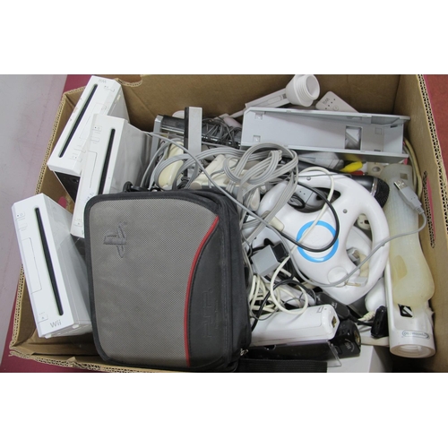 742 - A Quantity of Nintendo WII Gaming consoles and Peripherals, to include three WII consoles, hand held... 