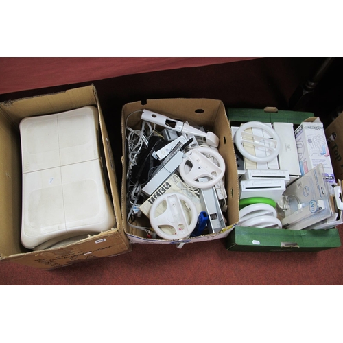 753 - A Quantity of Nintendo WII Gaming Consoles and Peripherals, to include six consoles, five balance bo... 