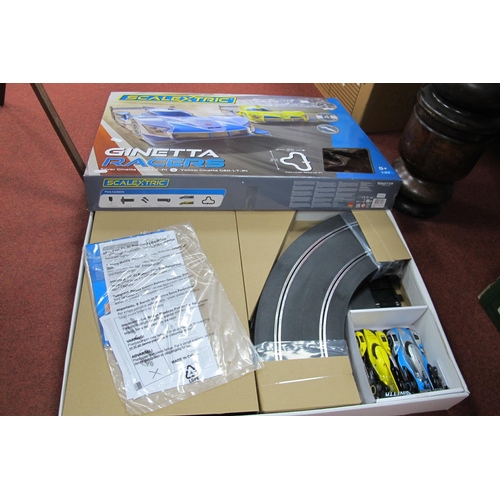 851 - A Scalextric #C1412 Ginetta Racers 1:32nd Scale Slot Car Set, box contents, Silver Ginetta G60-LT-PI... 