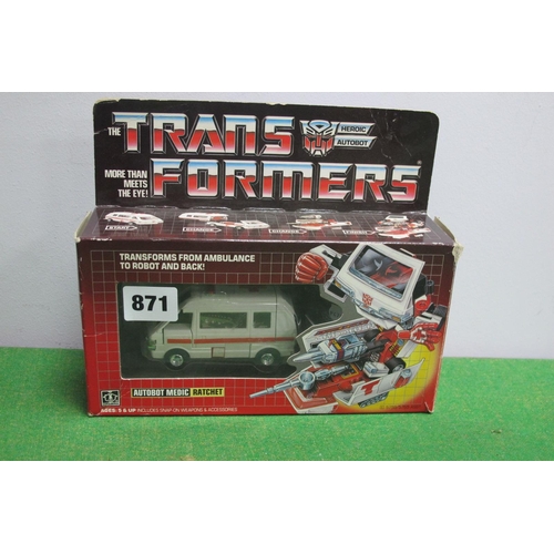 871 - An Original Boxed G1 Hasbro Transformers GI Autobot Medic Ratchet, box contents, include ambulance/r... 