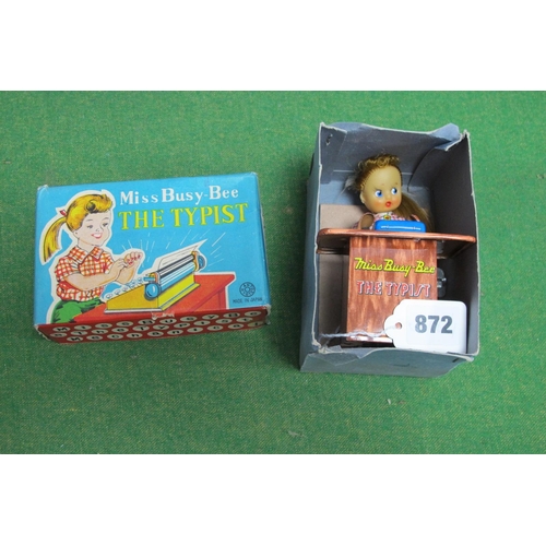 872 - A Kanto Toys (Japan) Tinplate Miss Busy Bee The Typist Clockwork Toy, boxed.