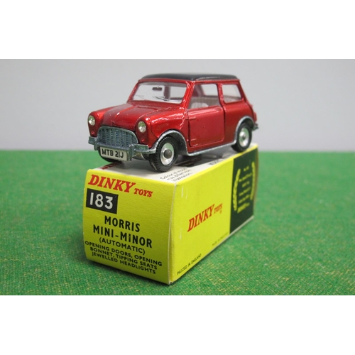 875 - A Boxed Dinky Toys #183 Diecast Model Morris Mini-Minor (Automatic), metallic red body, white interi... 