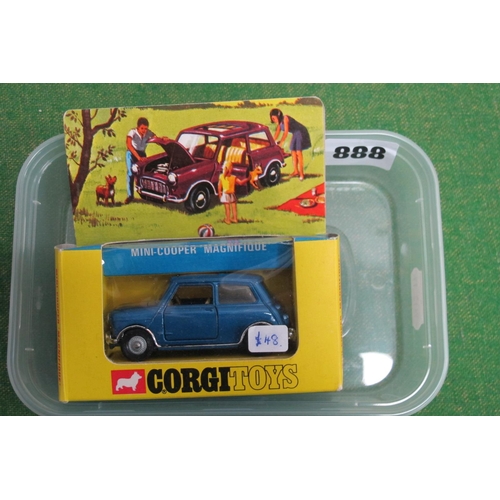 888 - A Boxed Corgi Toys #334 Diecast Model Mini-Cooper 'Magnifique', metallic dark blue body, cream inter... 