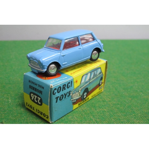 893 - A Boxed Corgi Toys #226 Diecast Model Morris Mini-Minor, pale blue body, red interior, 'flat shaped ... 