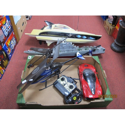 487 - Four Radio Controlled Models, comprising Island Cruiser, Syma S33 Helicopter, Rastar 1:14 Ferrari La... 