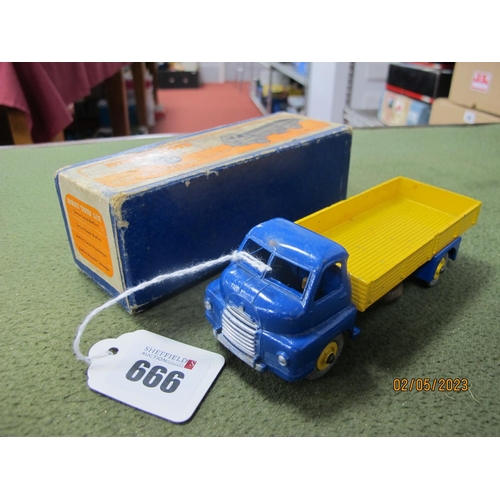 666 - A Boxed Finky Toys No. 522 Big Bedfors Lorry, dark blue cab, yellow truck body, yellow hubs, multipl... 