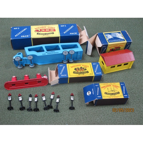 671 - Four Boxed Matchbox 'Lesney' 1-75 Series Diecast Model Accessory Packs, comprising of No 2 car trans... 