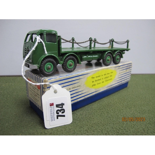 734 - Dinky Toys No.905 Foden Flat Truck, with chains, dark green cab, chassis, flatbed and hubs, glue rep... 