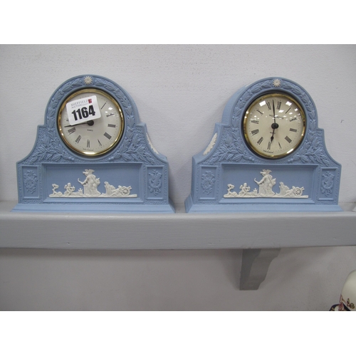 1164 - A Pair of Wedgwood Powder Blue Dome Cased Quartz Mantle Clocks, each with flower head to top and cla... 