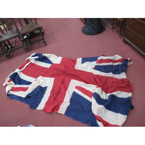 1343 - A Union Jack Flag, circa mid XX Century, in cotton, 4cm tear in one corner 156 x 292cm.