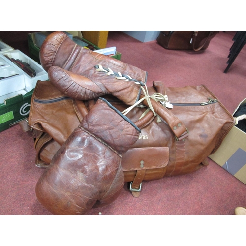 1355 - Mark Cross Co' A pair of vintage brown leather boxing gloves, together with large brown leather hold... 