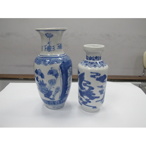 1320 - Oriental, Pair of Chinese blue & white cylindrical sleeve vases, featuring figures in garden scenes,... 