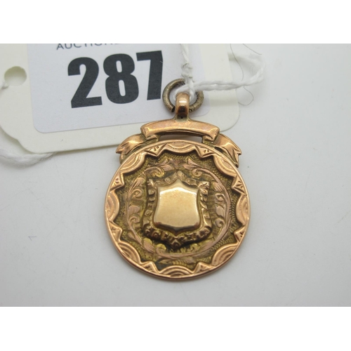 287 - A 9ct Gold Medallion Pendant, (hallmark part obscured) engraved verso