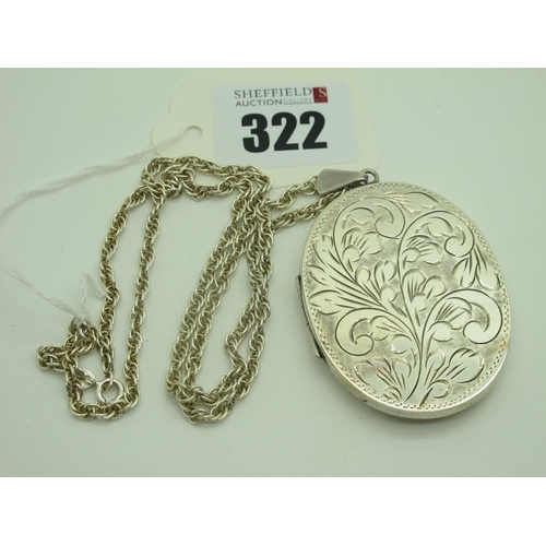 322 - A Large Hallmarked Silver Oval Locket Pendant, on a chain.