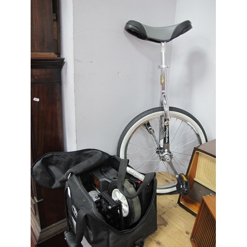 1130 - Unicycle, wheelchair power pack. (2).