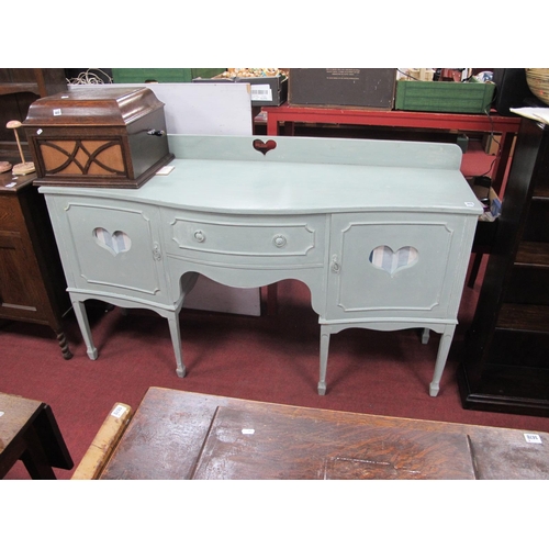 1473 - A Painted Serpentine Shaped Sideboard, with a low back, central drawer, flanking heat shaped cupboar... 