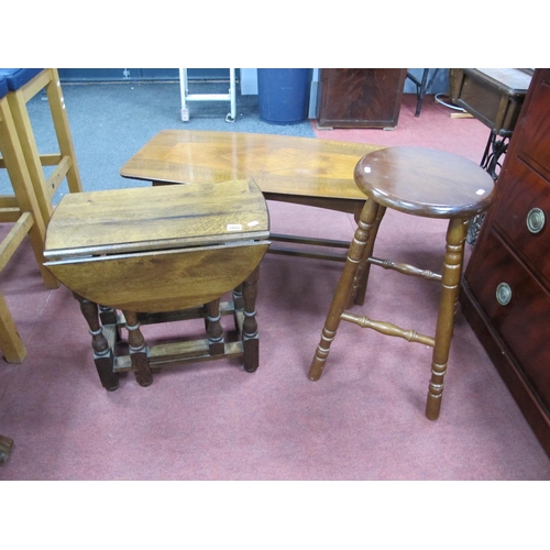 1491 - A Small Oak Drop Leaf Table, on turned and block support, united by stretchers.