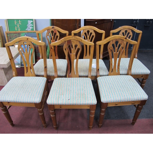 1508 - A Set of Eight Ducal Pine Dining Chairs, shaped top rail, pierced splats, upholstered seats, on turn... 