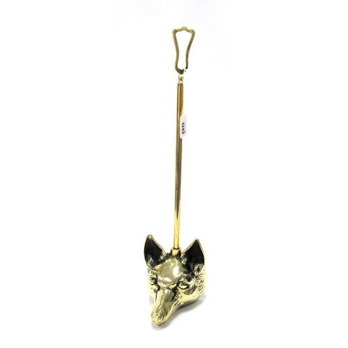 1242 - A Brass Door Stop, with elongated handle, the base as a fox head, 52.5cm high.