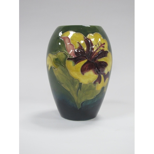 1259 - Moorcroft Pottery Vase, of ovoid form, hibiscus style pattern on green ground, 13cm.
