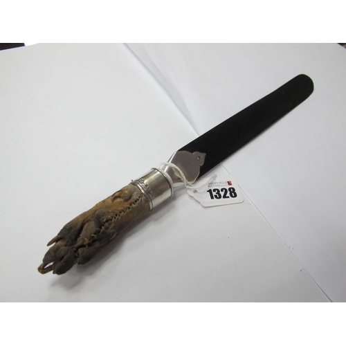 1328 - An Early XX Century Ebony Page Turner, with animal claw handle, silver hallmarked band with inscript... 