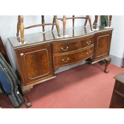 1586 - An Early XX Century Mahogany Bow Fronted Sideboard, with a low back, two central drawers, flanking c... 